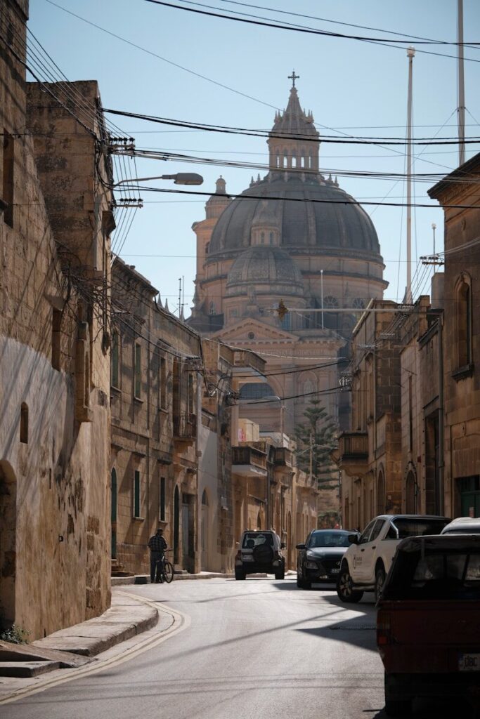 a street with cars parked on both sides of it